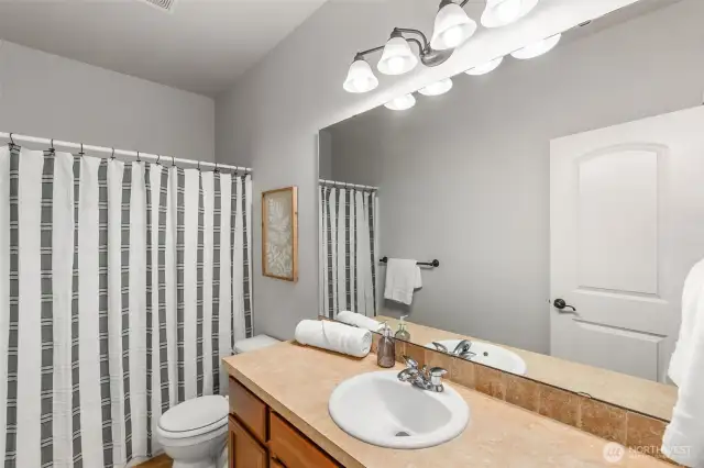 Full bathroom #3 is shared by the 2 downstairs bedrooms.