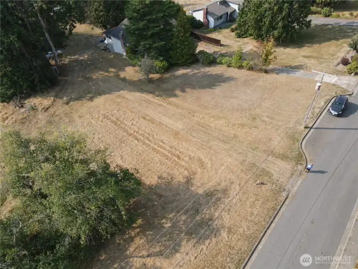 driveway access in center of photo (approximate property line-to be verified by buyer)