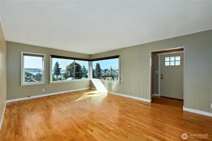 Entrance has an inset before stepping into the large bright beautiful living room!