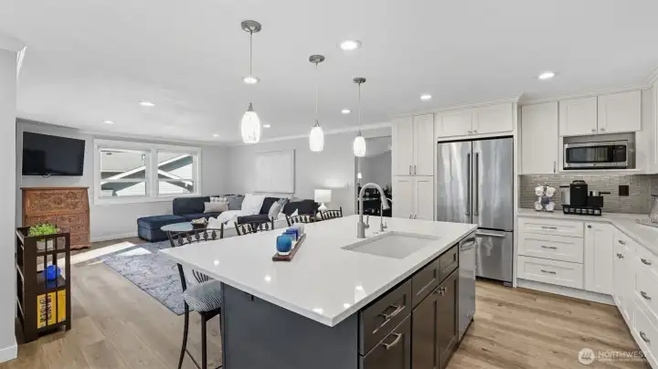 The kitchen and family room layout makes it easy to entertain or enjoy family time.