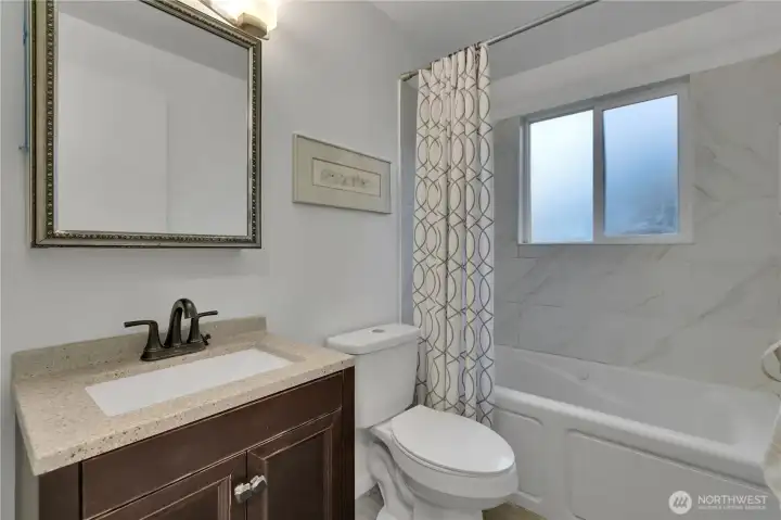 The office (or a bedroom) has an entrance door to the ADU which can be open or deadbolted....