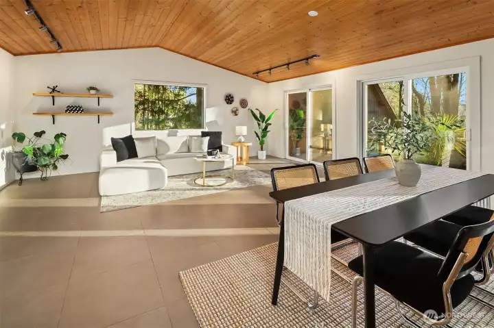 Relax or entertain in style in the stunning family room with 3 sets of sliding doors that open onto the expansive deck.