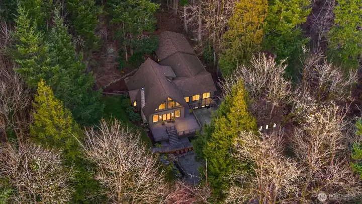 Tucked away on a quiet, sprawling lot for unparalleled peace and privacy.