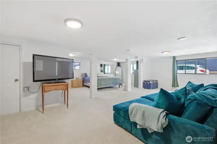 Lower-level recreation room with gas fireplace