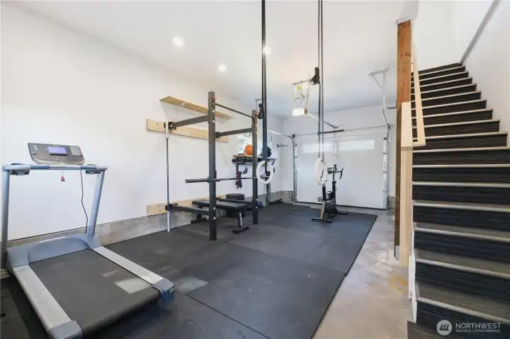 This is the garage which is being used as a gym - upstairs is a HUGE, finished loft are perfect for office, guest room, music room