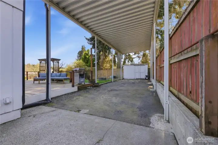 Large, covered RV Parking with full hook-up