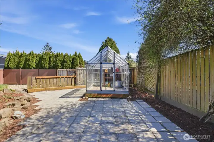 Green house and Chicken Coup behind it stay