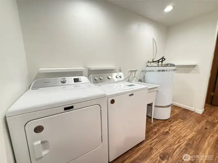 Laundry room with included washer and dryer