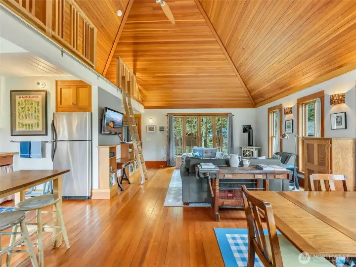Living room with open layout and custom woodwork