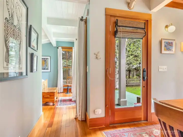 hallway leading to the main bedroom, laundry area, work space and bathroom