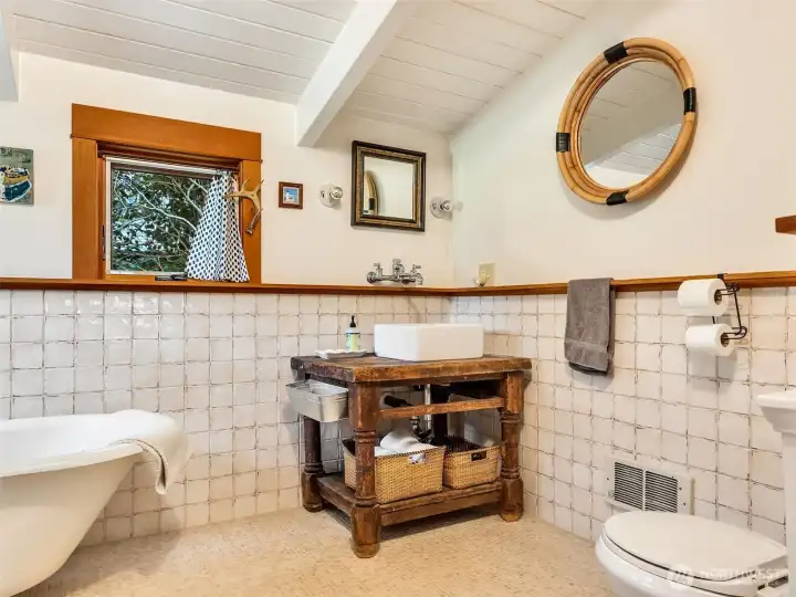 Bathroom with clawfoot tub and vintage style
