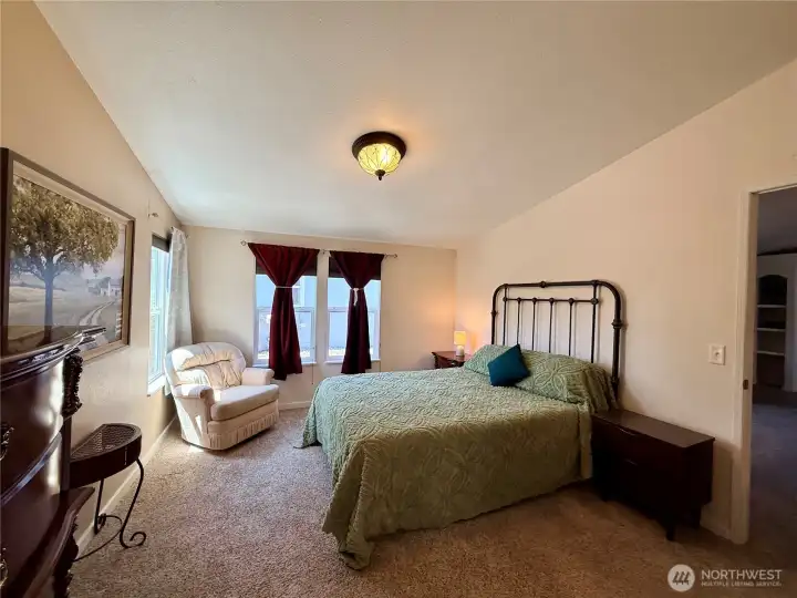 Another view of the primary bedroom.