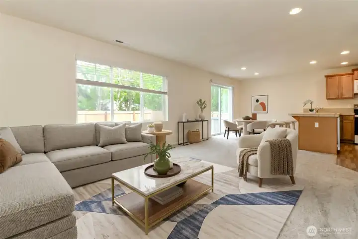 Open-Concept Living Area  Spacious open floor plan connecting the living room, dining area, and kitchen—ideal for everyday living and entertaining.