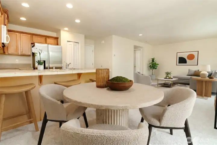 Kitchen & Pantry  Well-designed kitchen with side-by-side refrigerator, ample storage, and a convenient pantry for additional organization.