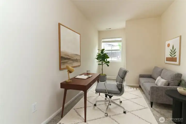 Dedicated Home Office / Flex Room  Bright and versatile main-level office, perfect for working from home, studying, or creating a quiet reading space.