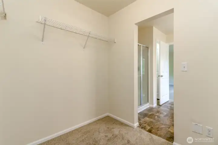 Walk-In Closet  Spacious walk-in closet offering excellent storage and organization for clothing and accessories.