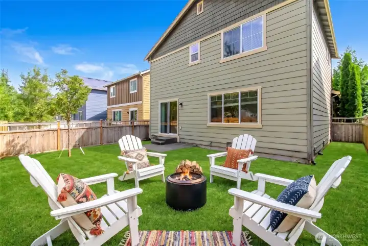 Private Backyard  Fully fenced backyard with a patio and beautifully maintained lawn—perfect for outdoor entertaining, relaxing, or play.