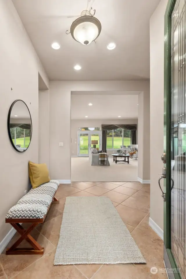 Welcoming foyer with leaded glass door.