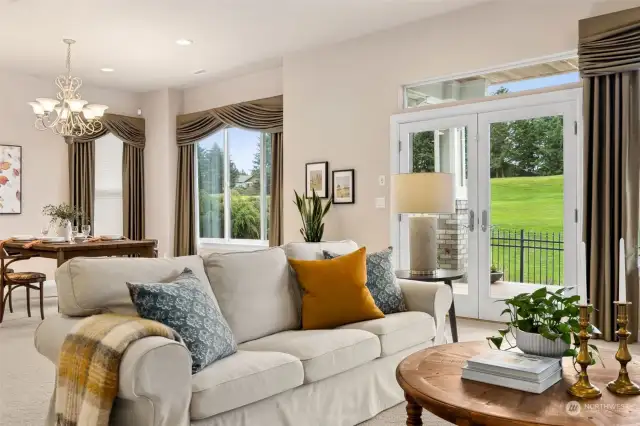 Enjoy the comfort of this elegant home with the most beautiful green view of a sweeping golf course. Custom made drapery and French doors to covered deck.