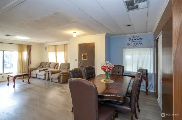 A view from the kitchen overlooking the living and dining areas, creating an open and connected space.