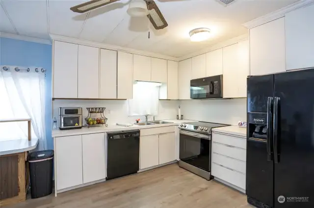 Kitchen complete with all appliances, thoughtfully included to make your move seamless and convenient.