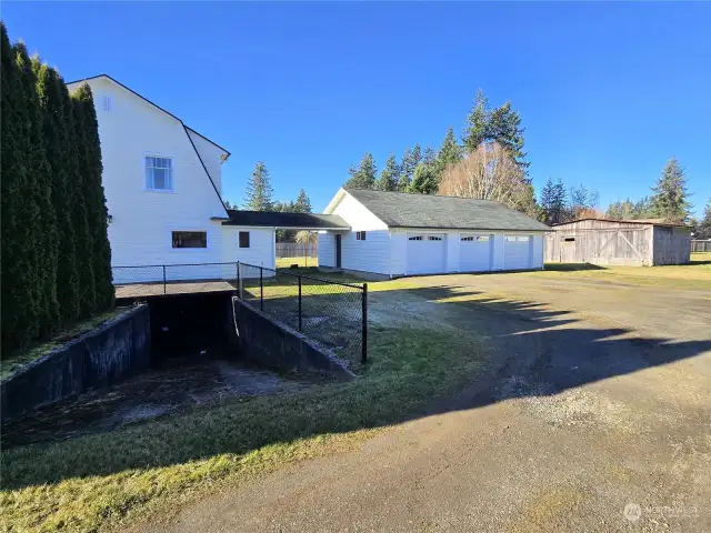 Notice breezeway attached to 3 car garage