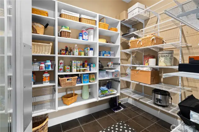 This extra large pantry is just off the kitchen in the laundry room area between the kitchen and garage. Photos of the laundry room are available on the addl photos website link. There simply wasn't enough space to include all areas of the home!