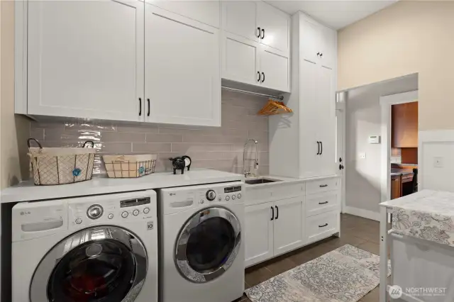Practical amenities include a laundry/mudroom, central vac, and a whole-house generator powered by natural gas. You’ll never be in the dark!