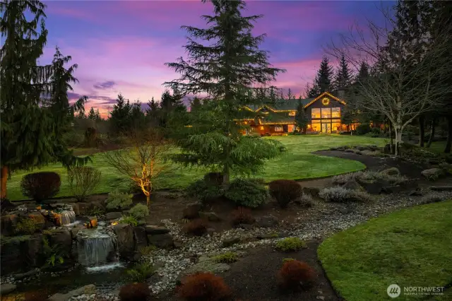 This 7+ acre bespoke estate welcomes you with the waterfall feature. It attracts deer and elk.