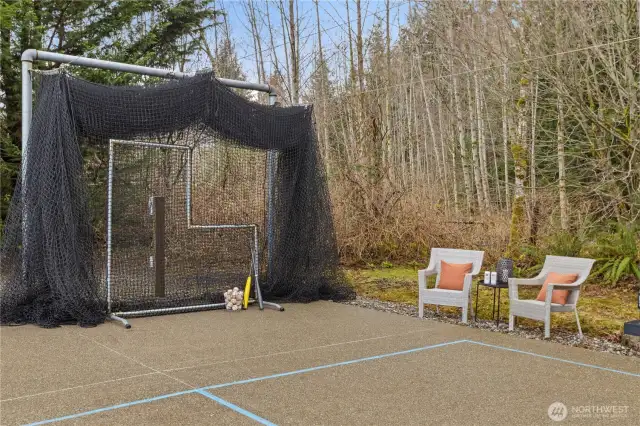 The sport court also has a professional-grade batting cage and L-screen. This is easily stowed in the detached garage in the off-season.