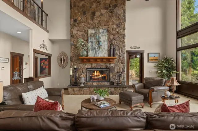 The wood burning stone fireplace has a gas fire-starter so you never have to worry about kindling. Built into the side of the chimney is a metal lined wood storage box. Just open the door next to the fireplace and refill without dragging wood through the house.