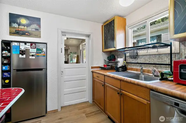 Kitchen. Door to Back Porch.