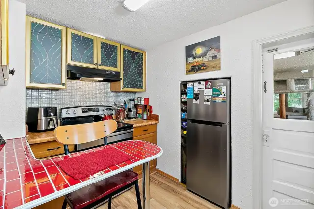 View of the Kitchen. All Appliances Stay.