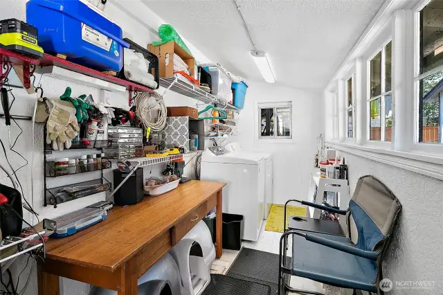 This is a Converted Back Porch. Enclosed Laundry. Great Storage!