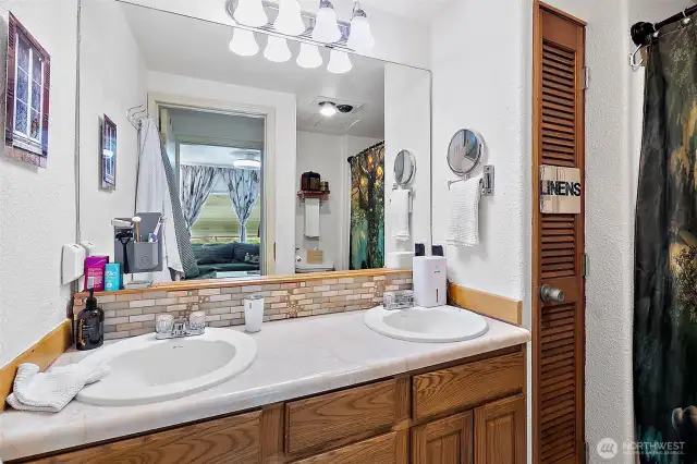 Bathroom has Double Sinks and Full Shower/Bath.