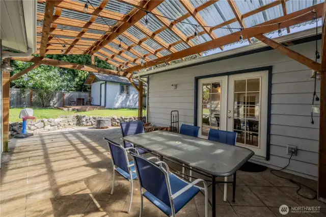 Covered patio space for your entertainment pleasure.  Relax outside while being protected from the elements.
