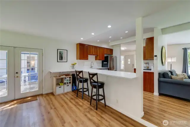 Step from the dining room to the kitchen counter.