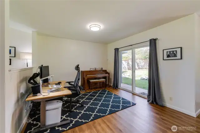 Extra living space off the dining room & living room which has a good view of the backyard.