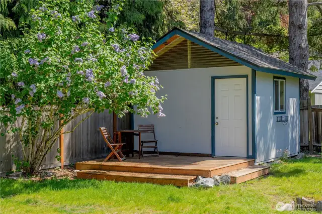 One of two sheds with newer roof.  You can also relax there under the shadows while enjoying the backyard.