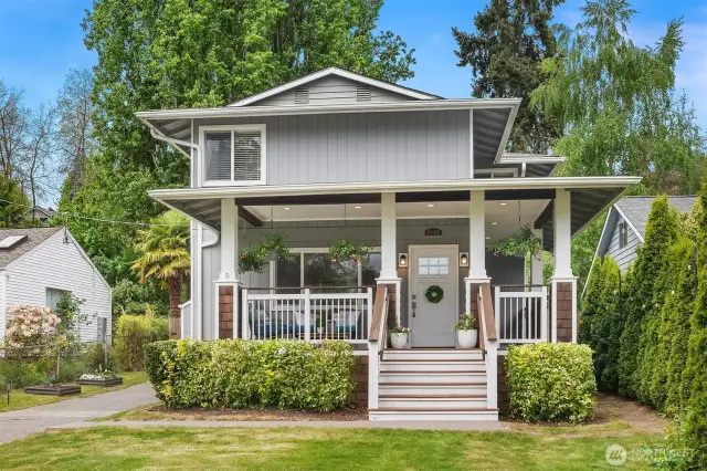Welcoming entry with a wrap-around, covered front porch