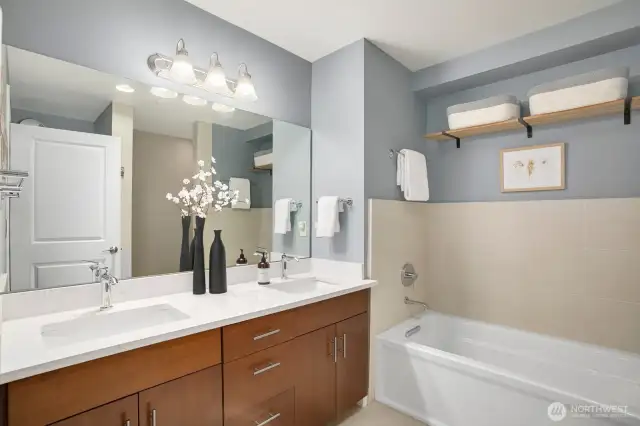 Primary bathroom has both a tub and shower.