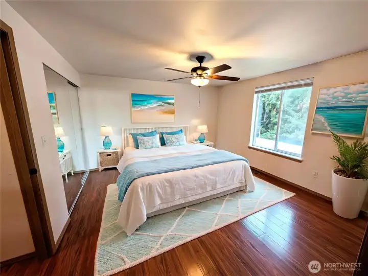 Primary bedroom suite. Light and bright on the upper level. Virtually staged to show versatility