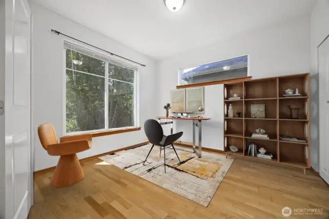 The bedroom off the living room and entry works well as an office, too.