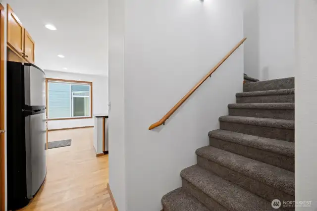 The stairway leads to the bonus room, bedrooms and baths