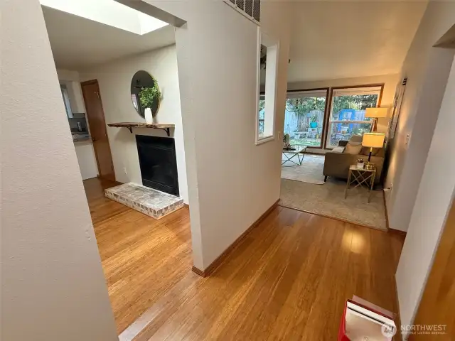 Bamboo entry opens to family room.   Circular floorplan thru kitchen, dining and living room