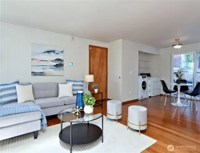 Family room next to entryway, door to garage