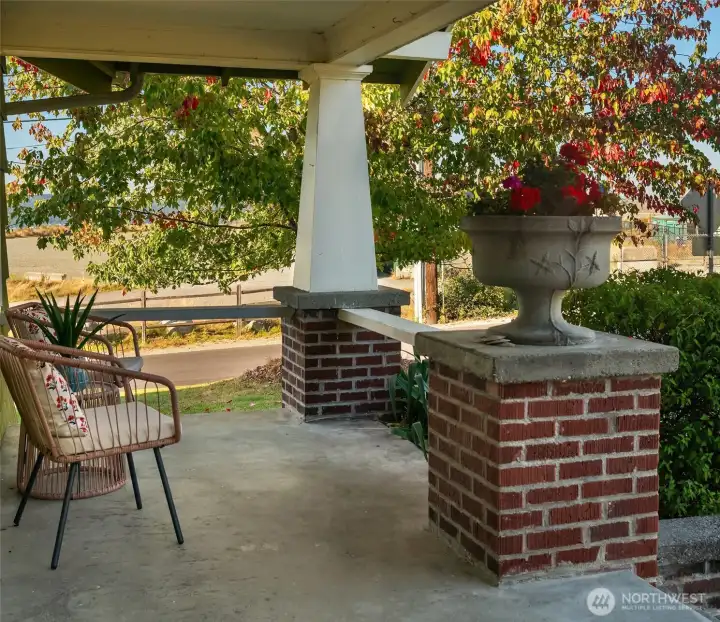Welcoming front porch greets you and is a great space to hang out and enjoy the neighborhood vibes.