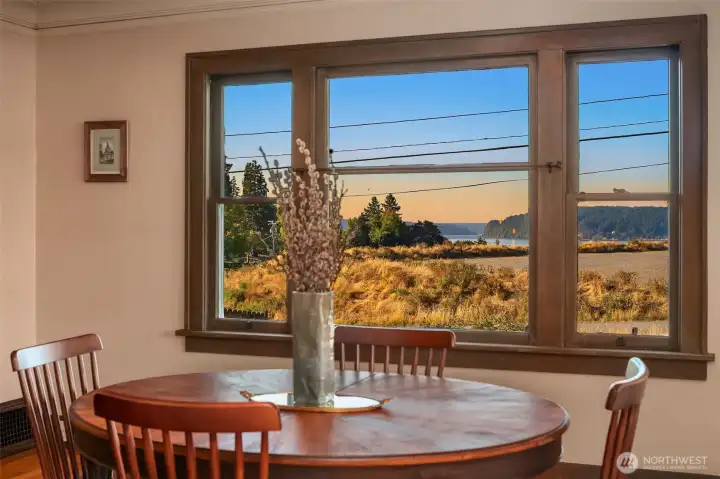 From your dining room table you can almost hear the low hum of the ferry.