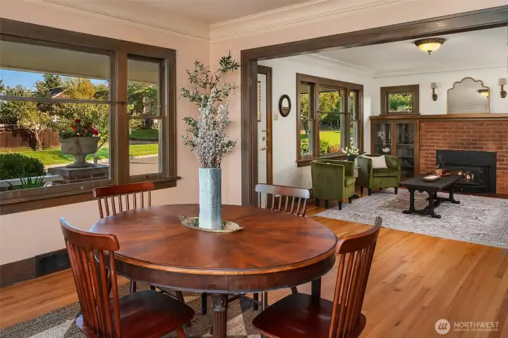 The dining room flows seamlessly into a spacious living area.