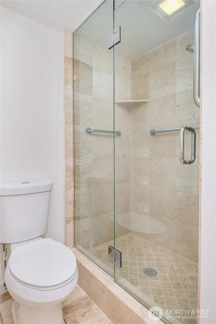 Guest bath shower and toilet.